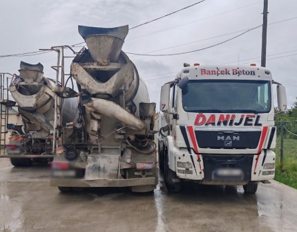 Concrete mixer trucks in a construction fleet